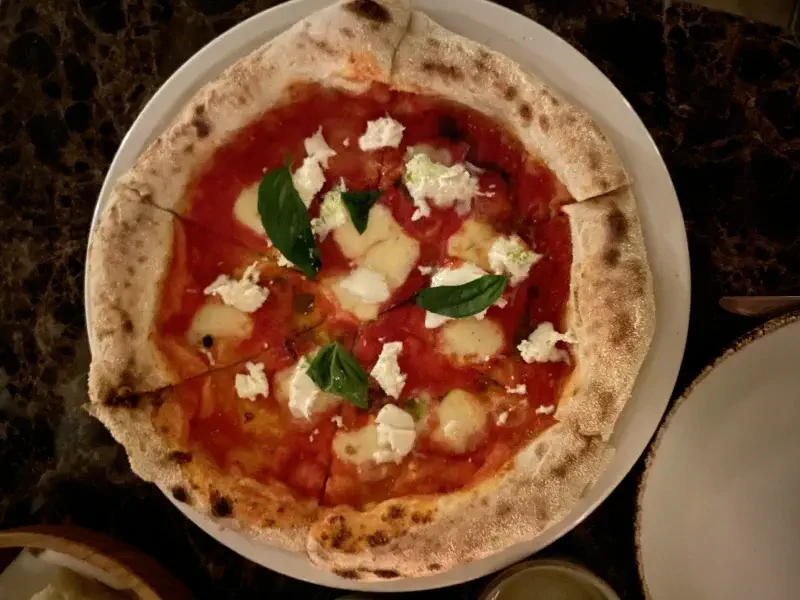 Top-down view of pizza at Amici