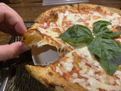 Crust close-up of pizza at Anita's Warung