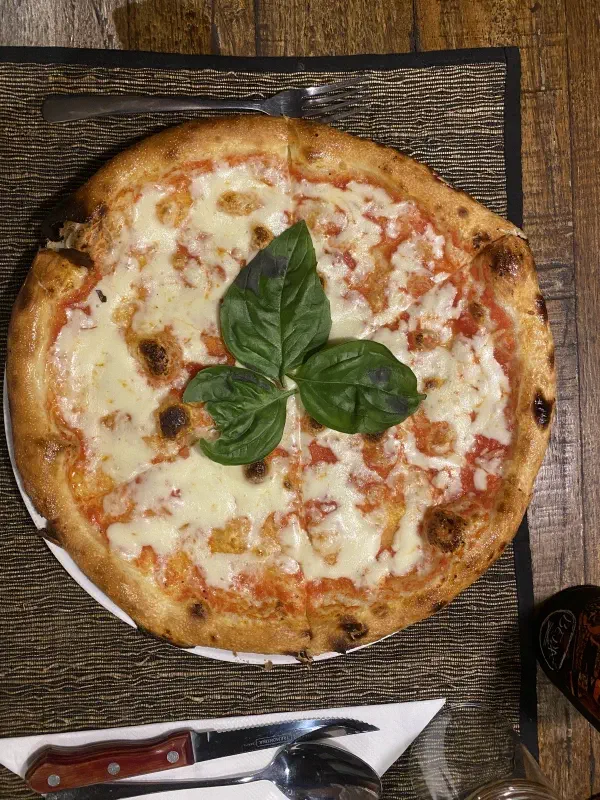 Top-down view of pizza at Anita's Warung