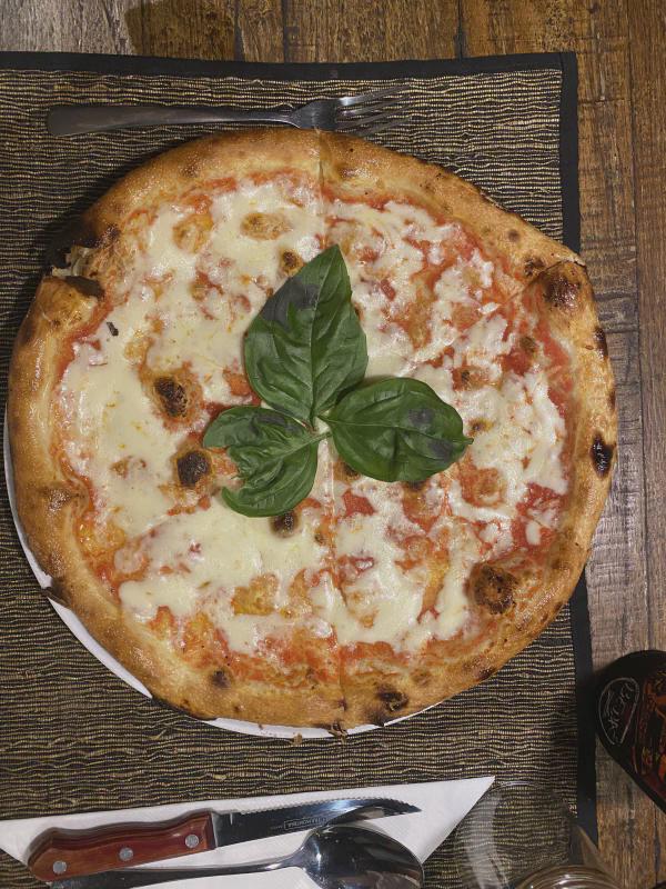 Top-down view of pizza at Anita's Warung