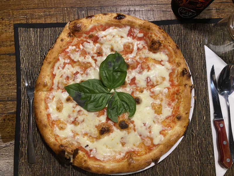 Top-down view of pizza at Anita's Warung