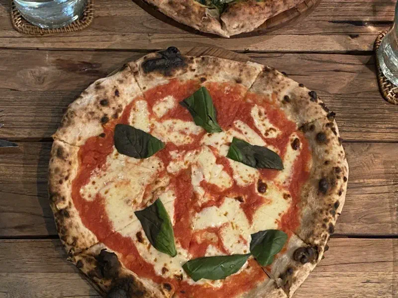 Top-down view of pizza at Arte