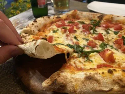 Crust close-up of pizza at Coco Bistro