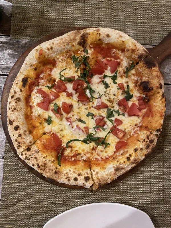 Top-down view of pizza at Coco Bistro