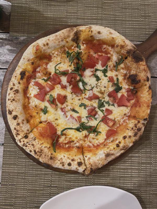 Top-down view of pizza at Coco Bistro