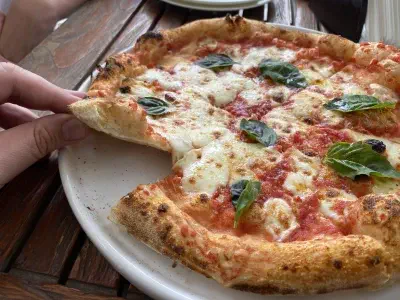 Crust close-up of pizza at Mazzoni Pizza