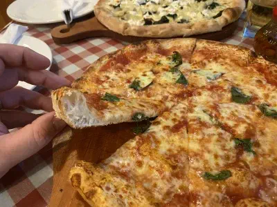 Crust close-up of pizza at Roby Pizza