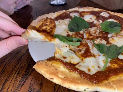 Crust close-up of pizza at The Barn