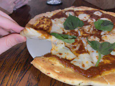 Crust close-up of pizza at The Barn