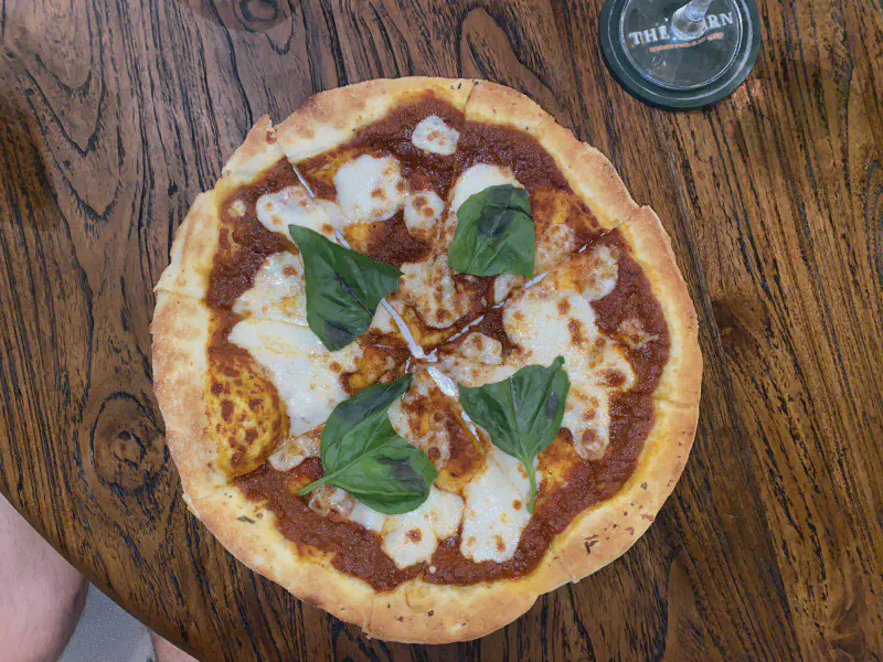 Top-down view of pizza at The Barn