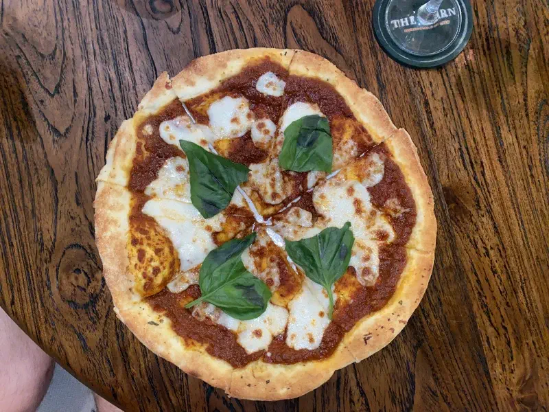 Top-down view of pizza at The Barn