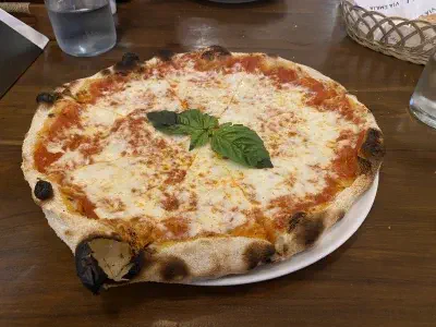 Angle view of pizza at Via Emilia