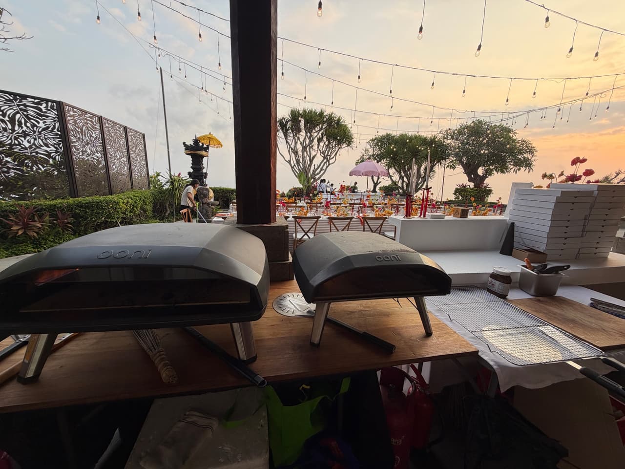 Two pizza ovens on the terrace at Stone Villas, Uluwatu, at sunset