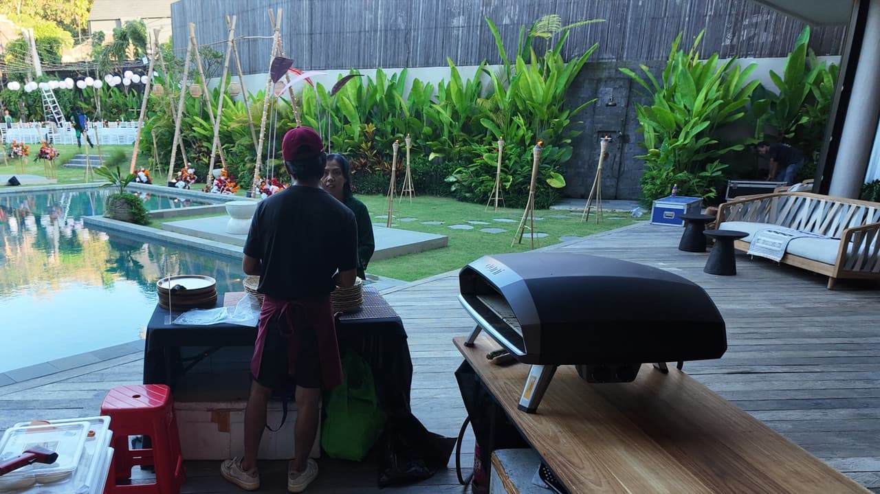 Our pizza oven on the pool deck at Victoriā Uluwatu, garden and paper lanterns behind