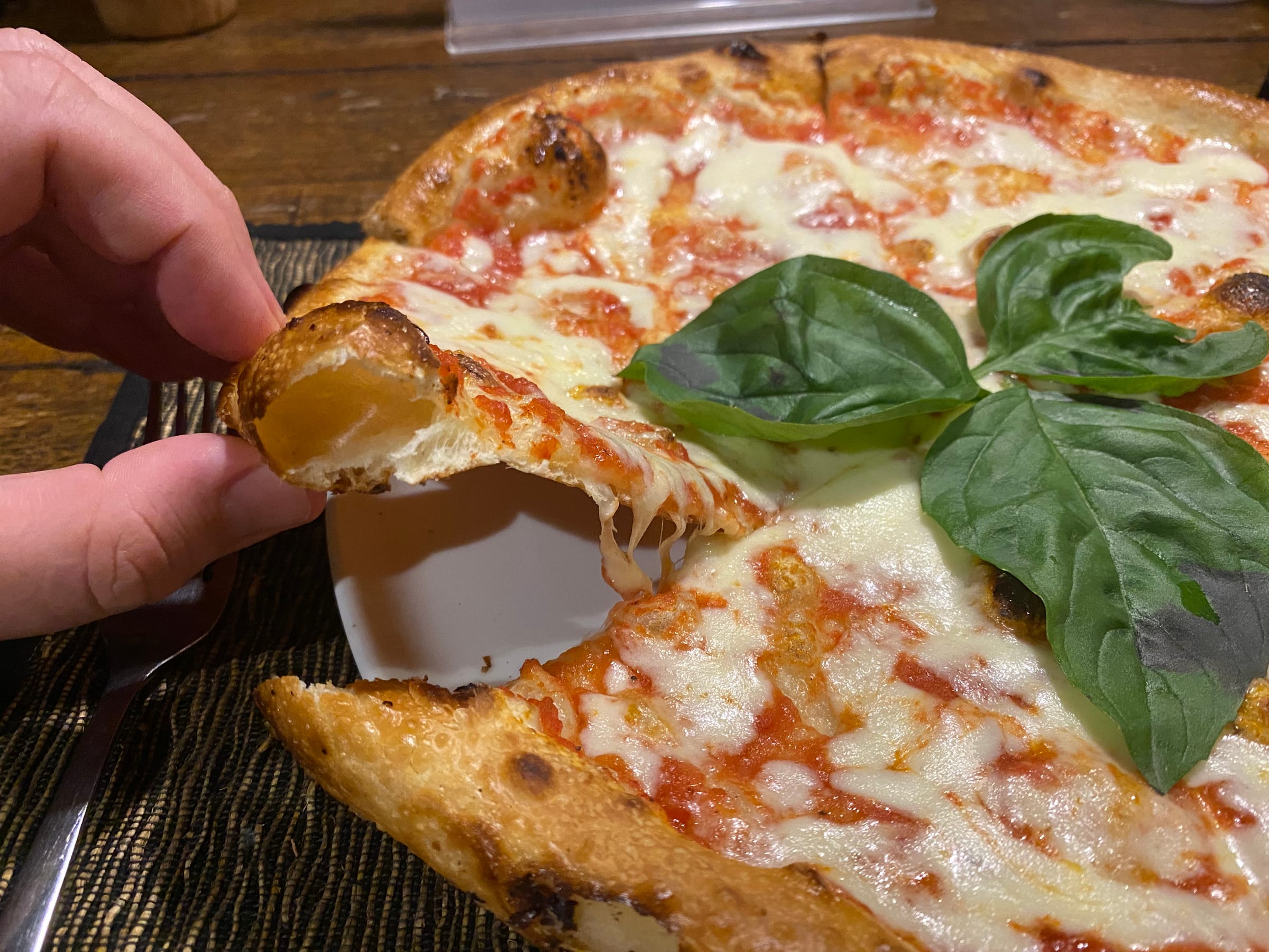 Crust close-up of pizza at Anita's Warung