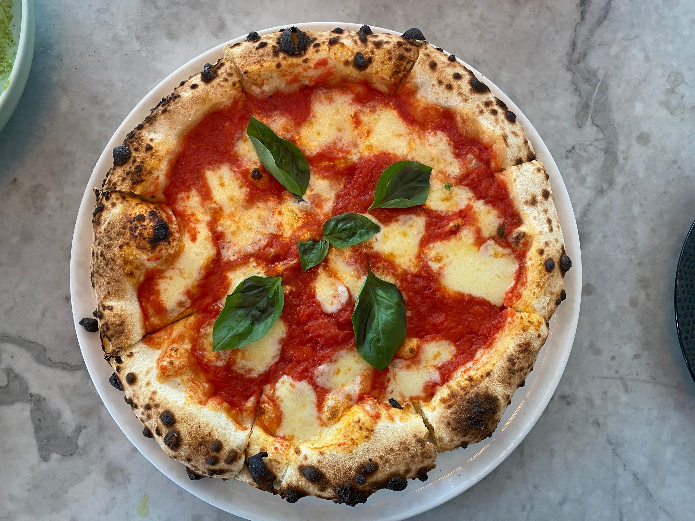 Top-down view of pizza at Bella Italia