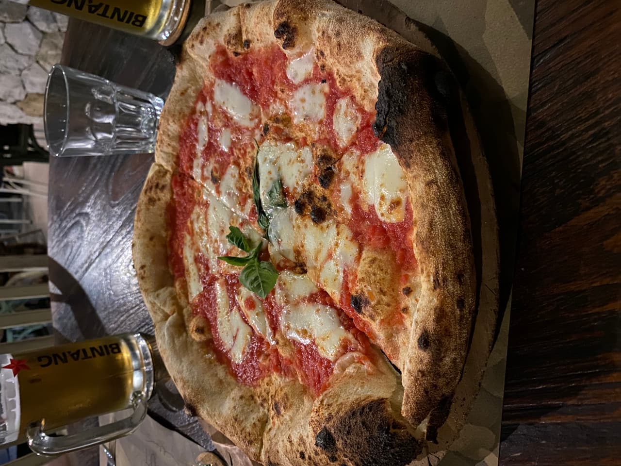 Angle view of pizza at L'Osteria